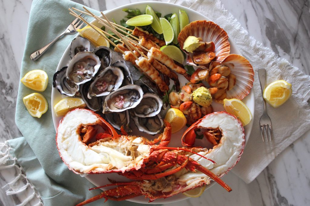  Seafood  platter  with fresh lobster oysters charred lime 